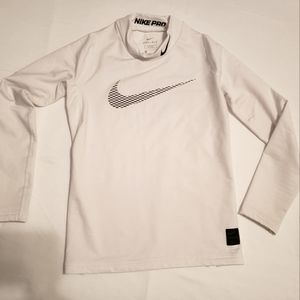 Nike dri-fit cold gear l/s tee sz LG kids (tight fitting)